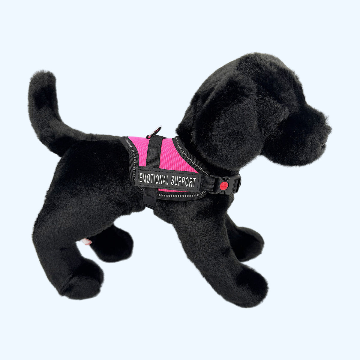 Pink ESSA Harness for Small and Medium worn by a black plush dog