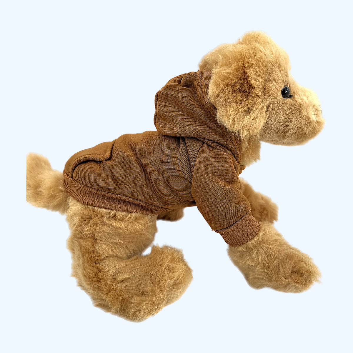 Brown ESSA Hoodie side view with ribbed cuffs on Medium plush dog