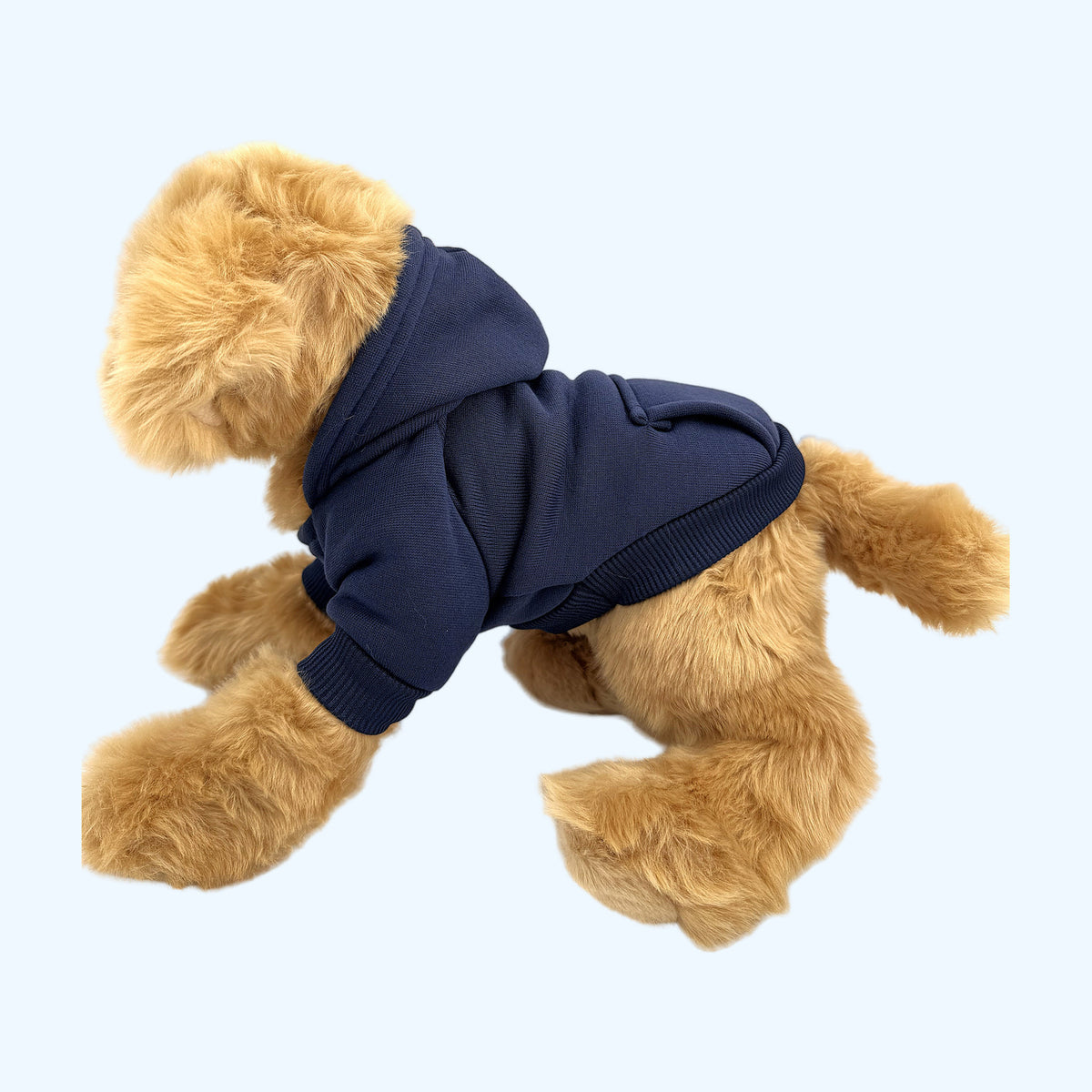 Navy ESSA Hoodie on Medium ESSA plush dog, left side showing front pocket