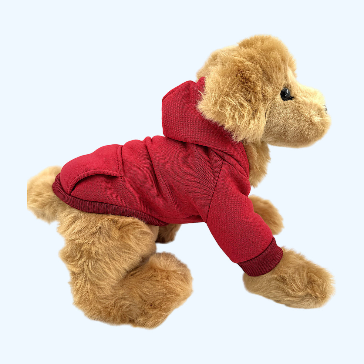 Red ESSA Hoodie side view with ribbed cuffs on Medium plush dog
