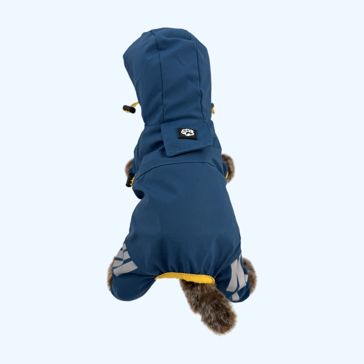 Navy ESSA Raincoat from behind showing hood, paw patch and reflective leg stripes
