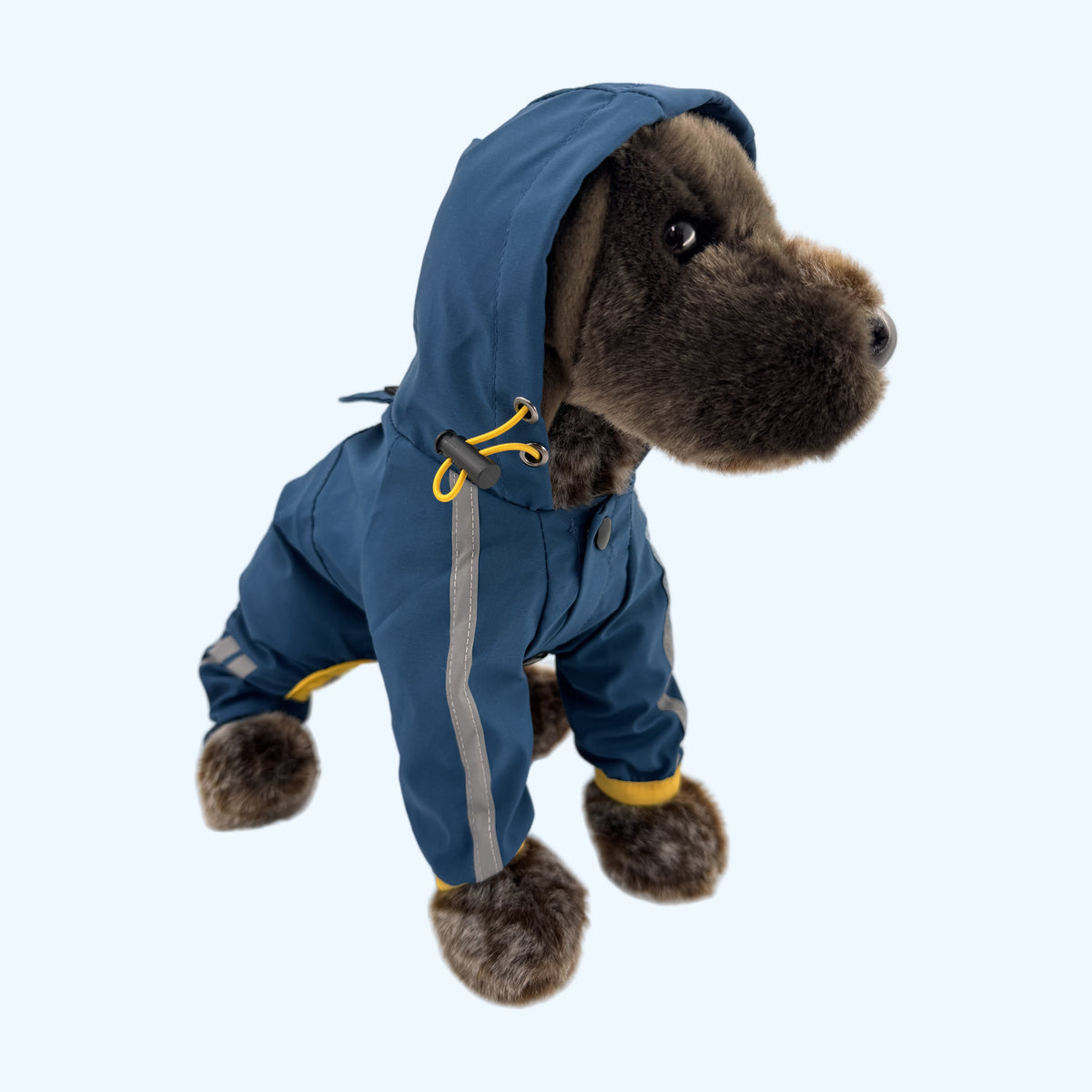 Navy ESSA Raincoat with yellow trim worn by Medium ESSA plush dog, front view