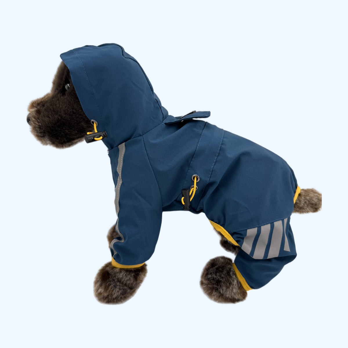 Navy ESSA Raincoat on Medium ESSA plush dog, left side showing yellow drawstring