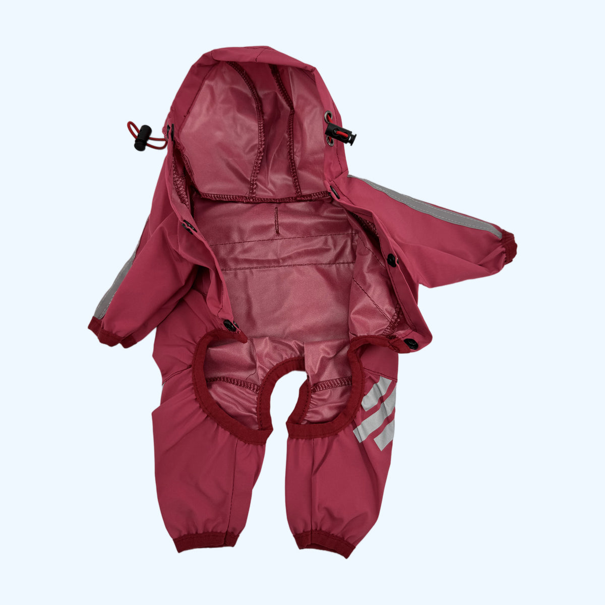 Raspberry ESSA Raincoat opened flat showing the inner lining and press studs