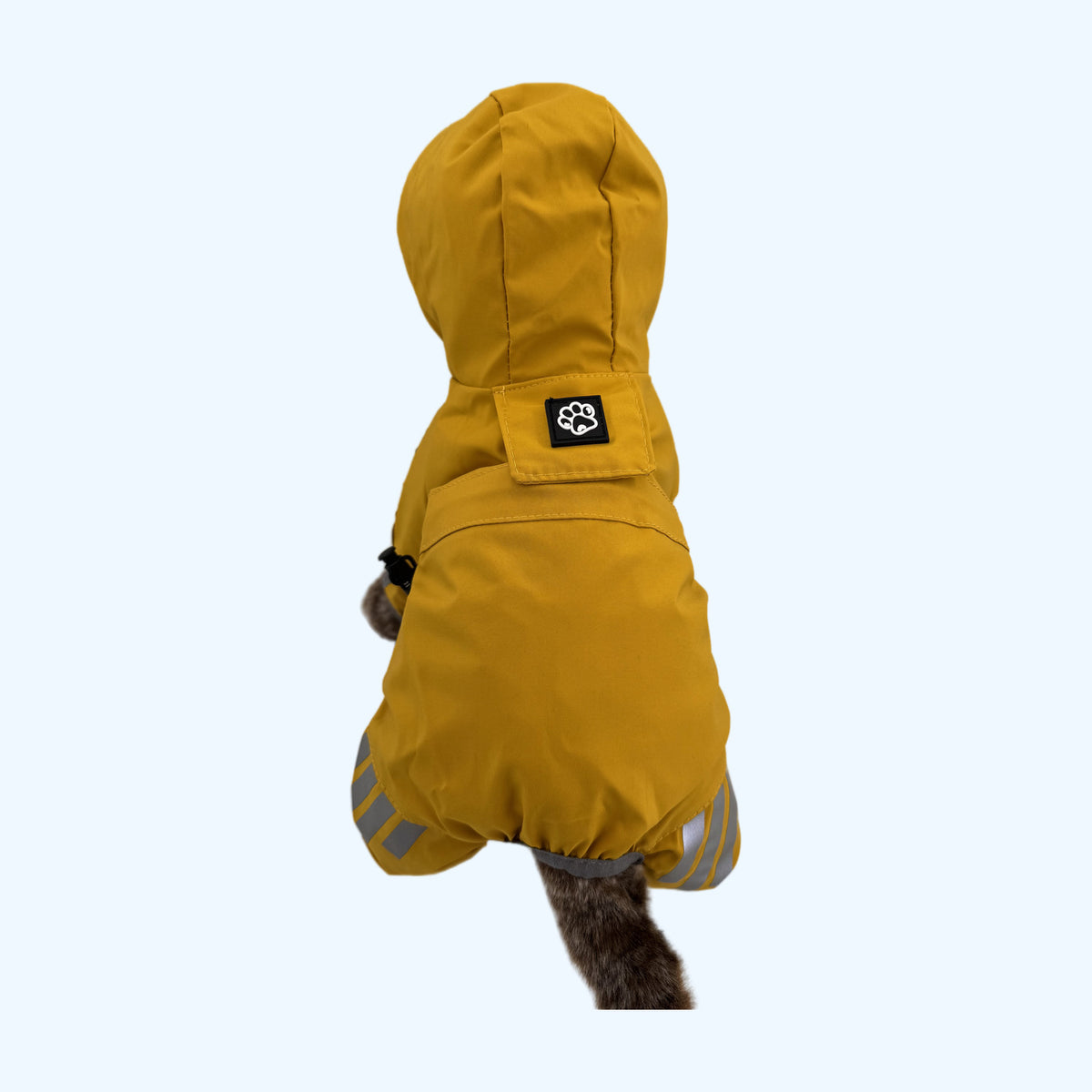 Yellow ESSA Raincoat from behind with hood, paw patch and reflective stripes