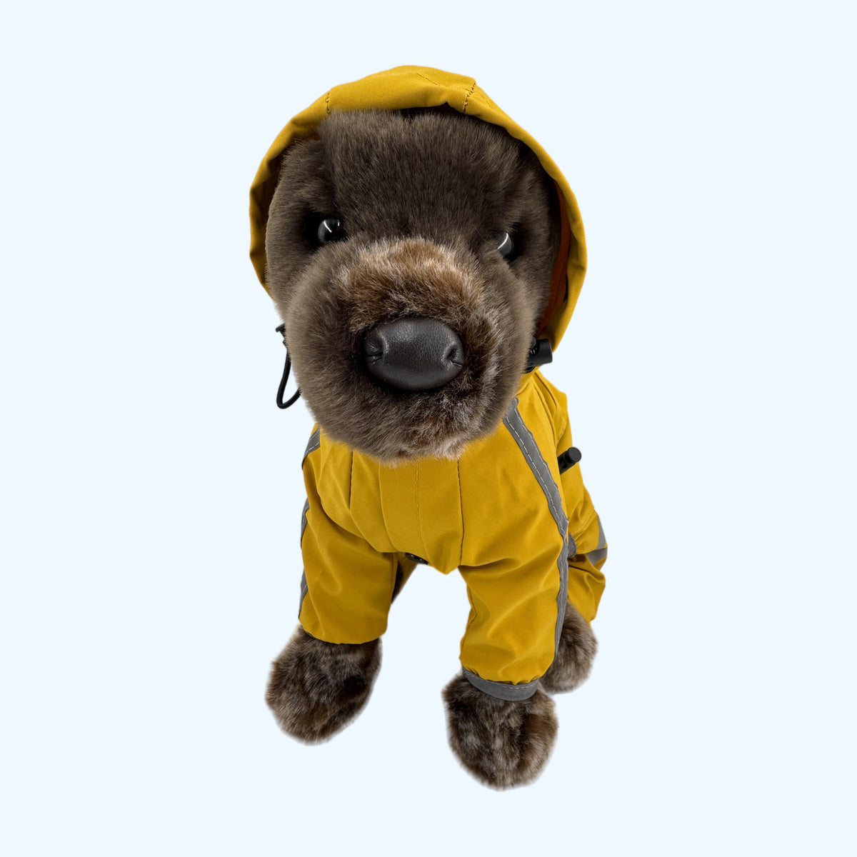 Yellow ESSA Raincoat drawstring hood framing the face of a Medium plush dog