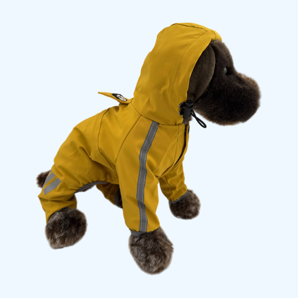 Yellow ESSA Raincoat side view showing reflective leg stripes on Medium plush