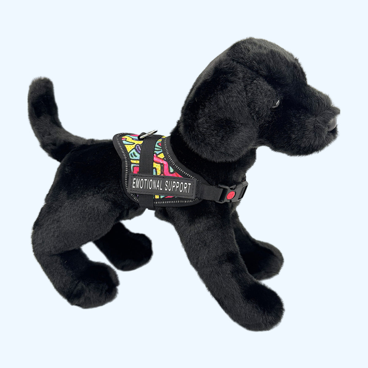 Graffiti ESSA Harness for Small and Medium worn by a black plush dog