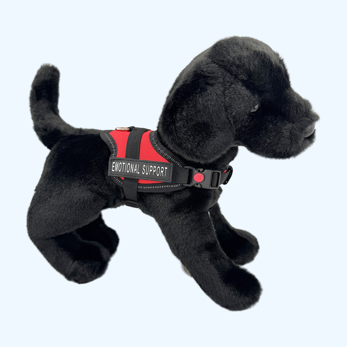 Red ESSA Harness for Small and Medium worn by a black plush dog